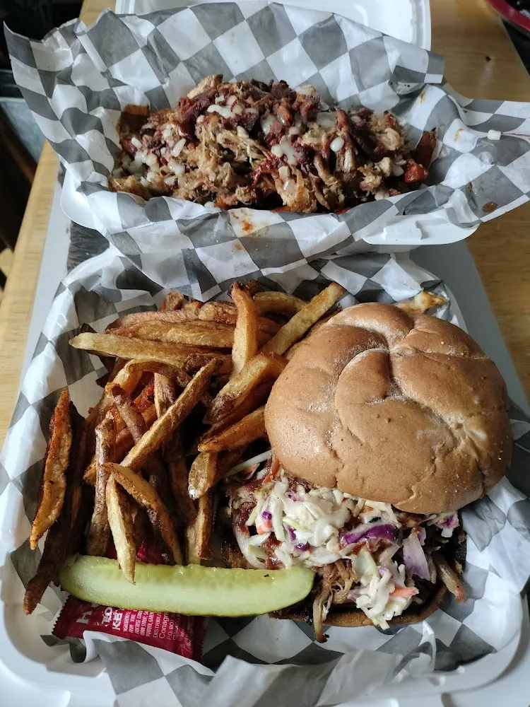 Pulled Pork Sandwich with the Grindstone Fries and Grindstone Loaded Pulled Pork with Everything